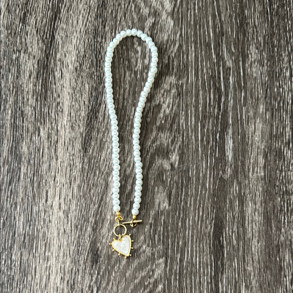 Elegant White Beaded Bracelet with Gold Heart Charm